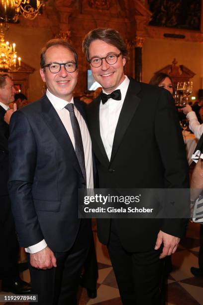Alexander Dobrindt and Andreas Scheuer, Minister of transit, during the new year reception of the Bavarian state government at Residenz on January...