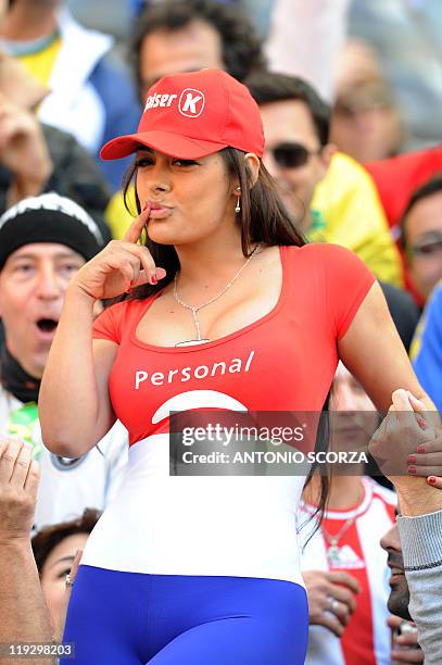 Paraguayan supporter Larissa Riquelme awaits the start of the 2011 Copa America quarter-final football matchagainst Brazil held at the Ciudad de La...