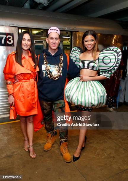 Kacey Musgraves, Jeremy Scott and Storm Reid attend the Moschino Prefall 2020 Runway Show front row at New York Transit Museum on December 09, 2019...