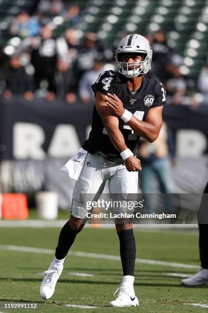 DeShone Kizer of the Oakland Raiders warms up before the game against the Tennessee Titans at RingCentral Coliseum on December 08, 2019 in Oakland,...