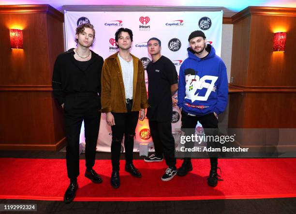 Luke Hemmings, Ashton Irwin, Calum Hood, and Michael Clifford of 5 Seconds of Summer attends 101.3 KDWB's Jingle Ball 2019 presented by Capital One...