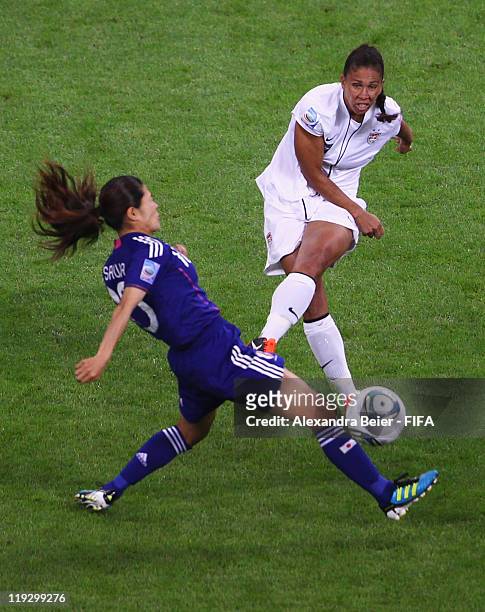 Homare Sawa of Japan fights for the ball with Shannon Boxx of USA during the FIFA Women's World Cup Final match between Japan and USA at the FIFA...
