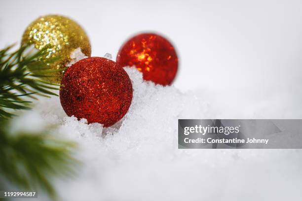 christmas balls on snow close up view - fake snow stock pictures, royalty-free photos & images