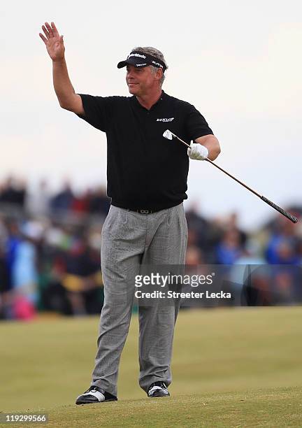 Darren Clarke of Northern Ireland quiets the crowd on the 18th hole during the final round of The 140th Open Championship at Royal St George's on...
