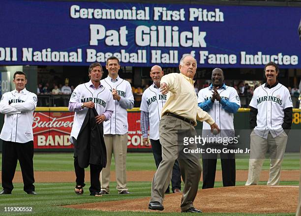 Former Seattle Mariners' general manager Pat Gillick throws out the ceremonial first pitch prior to the game against the Texas Rangers at Safeco...