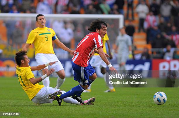 Neymar of Brazil struggles for the ball with Aureliano Torres of Paraguay during a match as part of Finals Quarters of 2011 Copa America at Ciudad de...