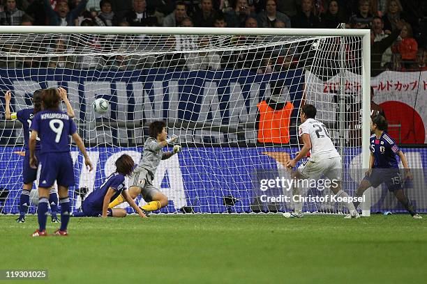 Abby Wambach of USA scores the second goal against Japan during the FIFA Women's World Cup Final match between Japan and USA at the FIFA World Cup...