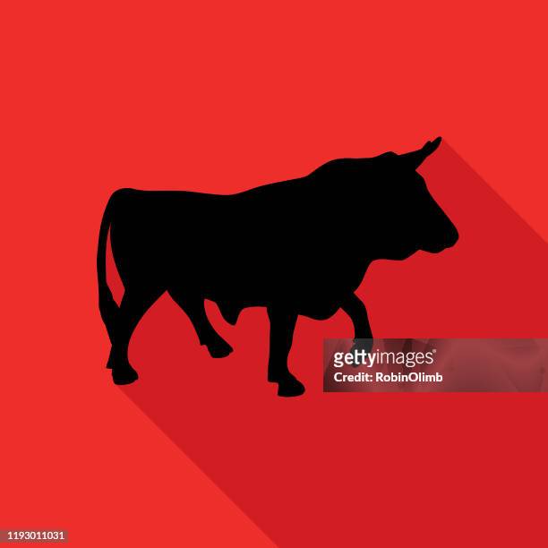 red and black bull icon - bullfighter stock illustrations