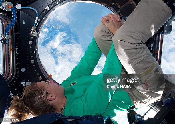 In this handout image provided by the National Aeronautics and Space Administration , NASA astronaut Sandy Magnus mission specialist for space...