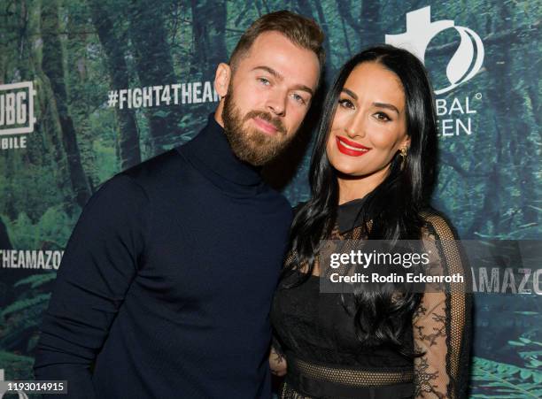 Artem Chigvintsev and Nikki Bella attend the PUBG Mobile's #FIGHT4THEAMAZON Event at Avalon Hollywood on December 09, 2019 in Los Angeles, California.