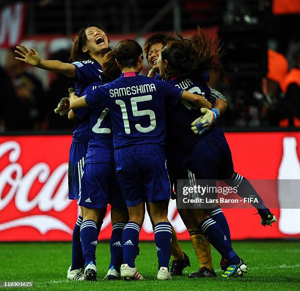 Goalkeeper Ayumi Kaihori of Japan celebrates with team mates after winning the FIFA Women's World Cup Final match between Japan and USA at the FIFA...