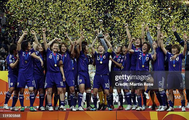 Homara Sawa of Japan lifts the trophy after winning the FIFA Women's World Cup Final match between Japan and USA at the FIFA World Cup stadium...