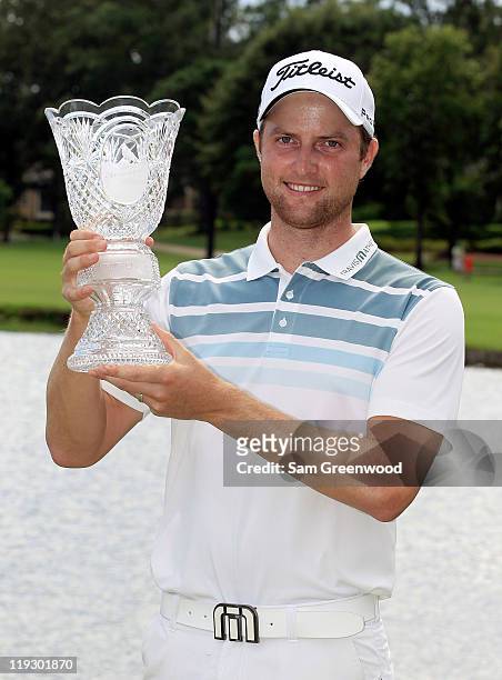 Chris Kirk poses with the trophy after winning the Viking Classic at Annandale Golf Club on July 17, 2011 in Madison, Mississippi.