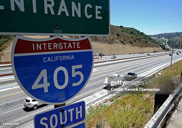 Light traffic flows on the Interstate 405 after it re-opened ahead of schedule following the10 mile shutdown of the nation's busiest freeway for...