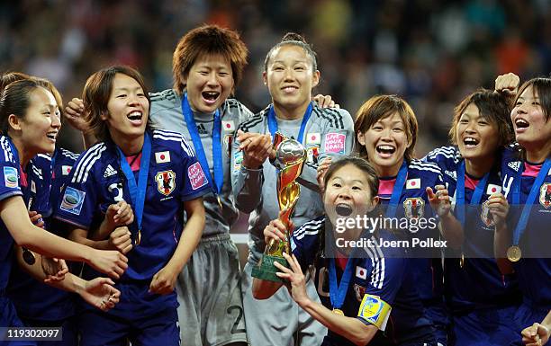 Homara Sawa of Japan lifts the trophy after the FIFA Women's World Cup Final match between Japan and USA at the FIFA World Cup stadium Frankfurt on...
