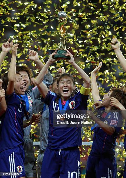 Homara Sawa of Japan lifts the trophy after the FIFA Women's World Cup Final match between Japan and USA at the FIFA World Cup stadium Frankfurt on...