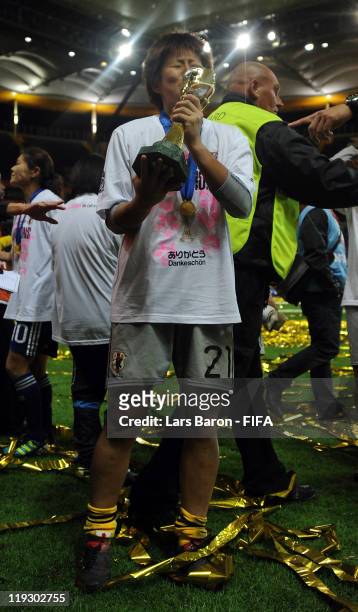 Goalkeeper Ayumi Kaihori of Japan kisses the trophy after winning the FIFA Women's World Cup Final match between Japan and USA at the FIFA Women's...