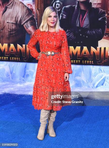 Tori Spelling arrives at the Premiere Of Sony Pictures' "Jumanji: The Next Level" on December 09, 2019 in Hollywood, California.