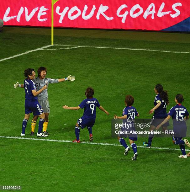 Saki Kumagai, goalkeeper Ayumi Kaihori, Nahomi Kawasumi, Mana Iwabuchi, Homare Sawa and Aya Sameshima of Japan celebrate their victory of the FIFA...