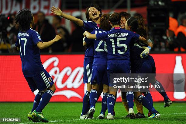 Goalkeeper Ayumi Kaihori of Japan celebrates with team mates after winning the FIFA Women's World Cup Final match between Japan and USA at the FIFA...