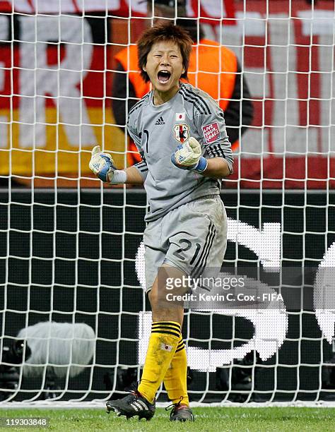 Goalkeeper Ayumi Kaihori of Japan reacts after a save on a penalty shot by USA during the FIFA Women's World Cup Final match between Japan and USA at...