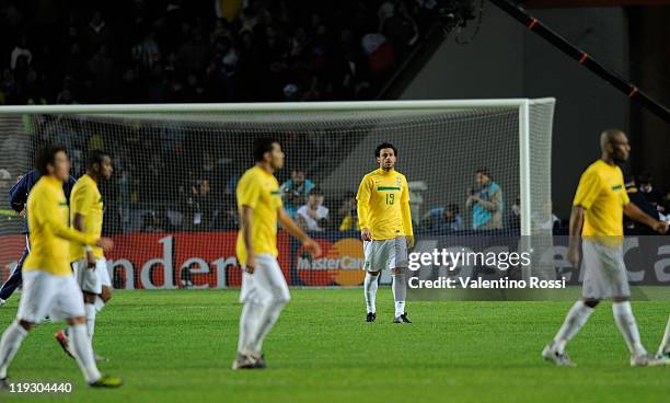 Brazil's Fred reacts near the teammate after missing a 2011 Copa America soccer match against Paraguay, as part of quarter finals at the Ciudad de La...