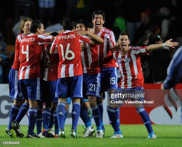 Paraguay's players celebrate after win against Brazil during 2011 Copa America soccer match as part of quarter finals at the Ciudad de La Plata...