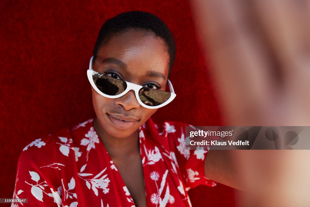 Portrait of woman wearing sunglasses