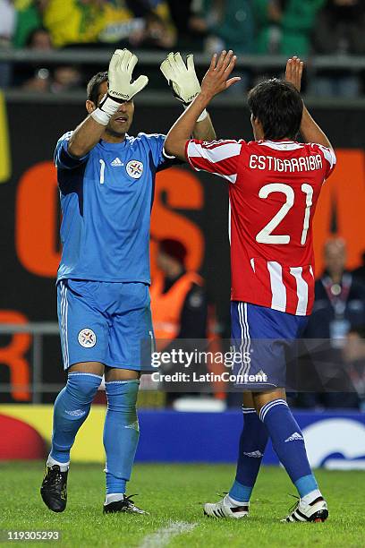 Goalkeeper Justo Villar and player Nestor Ortigoza during a quarter final match between Brazil and Paraguay as part of the Copa America 2011 at...