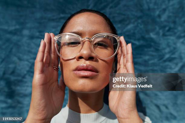 beautiful woman wearing eyeglasses - hand on hip bildbanksfoton och bilder