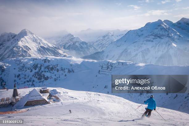 skier in zillertal arena ski resort. tyrol mayrhofen in austria in winter alps - zillertal stock-fotos und bilder