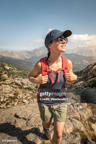 female hiker during hike, haute-corse, corsica, france - haute corse stock pictures, royalty-free photos & images