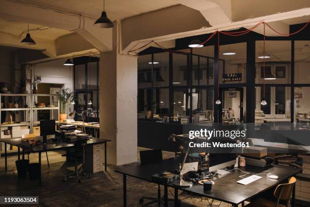 interior of a loft office - dark space stockfoto's en -beelden