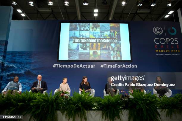 Swedish environment activist Greta Thunberg and German politician Luisa Neubauer attend to a conference with scientists at the COP25 Climate...