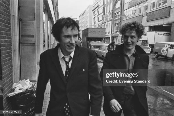 British singer Johnny Rotten of punk band Sex Pistols leaving Malborough Street Court after being fined for possessing illegal substances, London,...