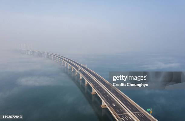 jiaozhou bay bridge of qingdao,shandong province,china - provinz shandong stock-fotos und bilder