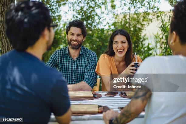 spending relaxing afternoon with friends - double date stock pictures, royalty-free photos & images