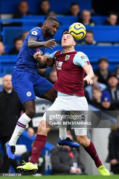 Chelsea's German defender Antonio Rudiger vies with Burnley's New Zealand striker Chris Wood during the English Premier League football match between...