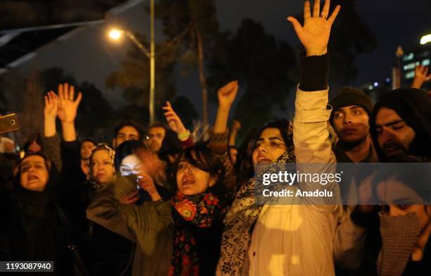 Iranians shout slogans against the government after a vigil held for the victims of the airplane of Ukrainian International Airlines that crashed...