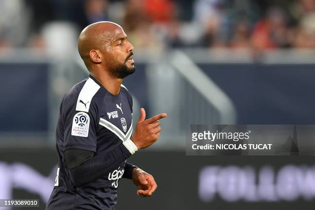 Bordeaux's French forward Jimmy Briand celebrates after scoring the opener during the French L1 football match between FC Girondins de Bordeaux and...