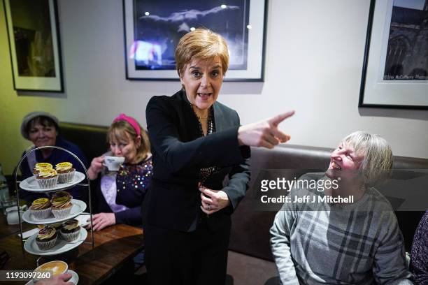 First Minister of Scotland Nicola Sturgeon and SNP general election candidate Mhairi Black campaign at Bianco E Nero on December 10, 2019 in Paisley,...