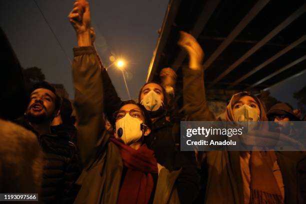 Iranians shout slogans against the government after a vigil held for the victims of the airplane of Ukrainian International Airlines that crashed...