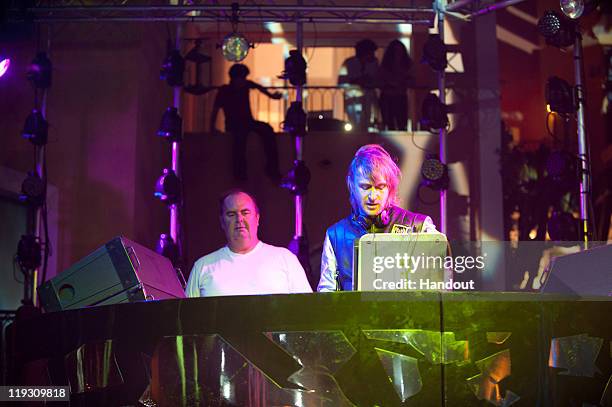 Jack. E and David Guetta perform during Hotel Byblos Summer Party at Hotel Byblos on July 13, 2011 in Saint-Tropez, France.