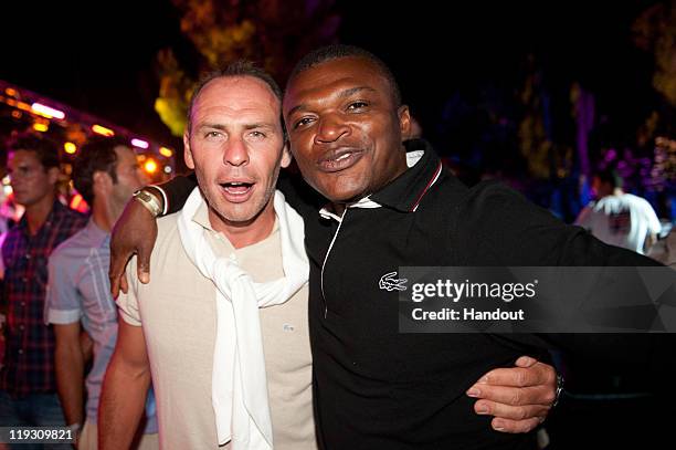 Alain Boghossian and Marcel Desailly attend Hotel Byblos Summer Party at Hotel Byblos on July 13, 2011 in Saint-Tropez, France.