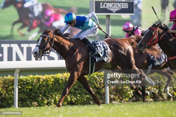 December 8 : Jockey Christophe Soumillon riding Japanese runner Admire Mars wins the Race 7 Longines Hong Kong Mile at Sha Tin Racecourse on December...