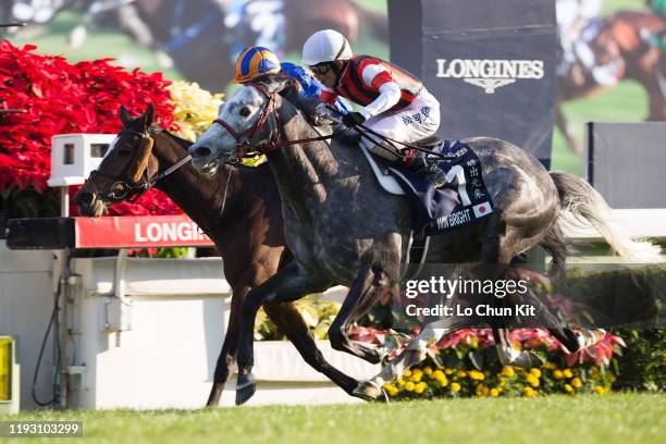 December 8 : Jockey Masami Matsuoka riding Japanese runner Win Bright wins Race 8 Longines Hong Kong Cup at Sha Tin Racecourse on December 8 , 2019...