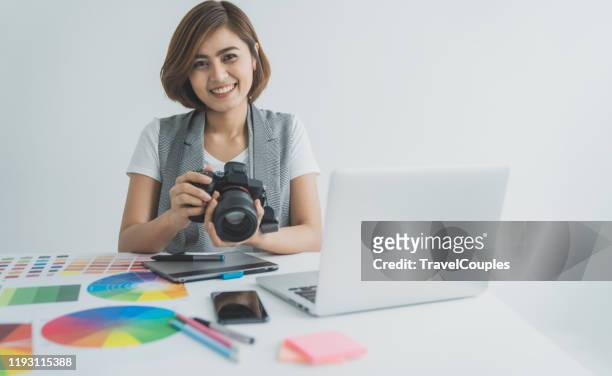 beautiful smiling women with camera. graphic designer at work. artist drawing something on graphic tablet at the office. graphic designer creativity editor ideas designer concept - cmyk stock pictures, royalty-free photos & images