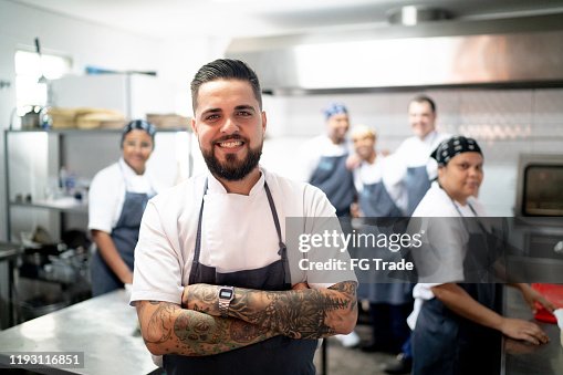 Chef Starting Roster Portrait Of Restaurant Chef With His Team In The Kitchen High-Res Stock ...