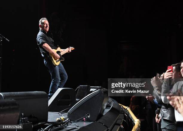 Bruce Springsteen performs onstage during The Rainforest Fund 30th Anniversary Benefit Concert Presents 'We'll Be Together Again' at Beacon Theatre...