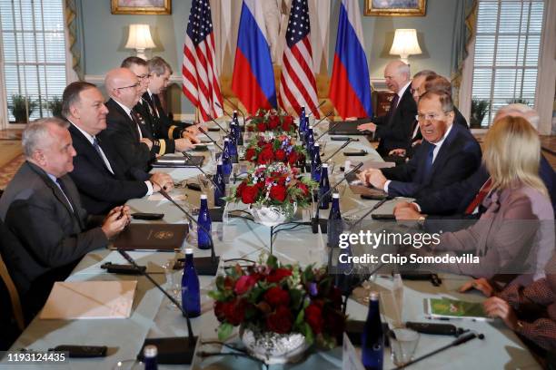 Secretary of State Mike Pompeo and his counterpart Russian Foreign Minister Sergey Lavrov sit down for a meeting in the Jefferson Room at the State...